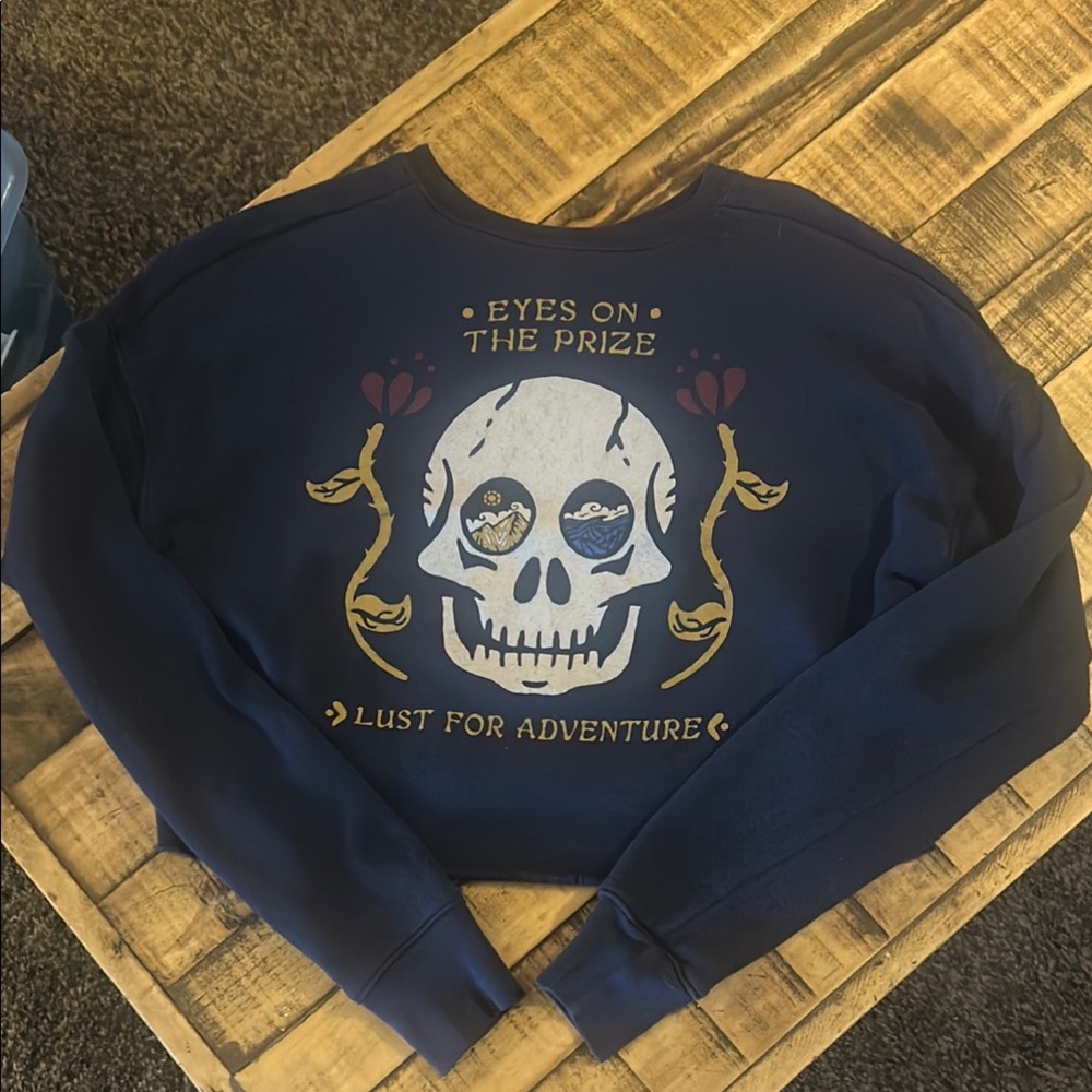 Skull Cropped Pullover Eyes on the Prize, Lust for Adventure!